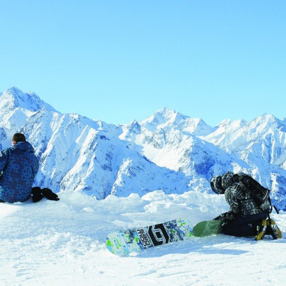 Tonale glacier shot with snowboarders