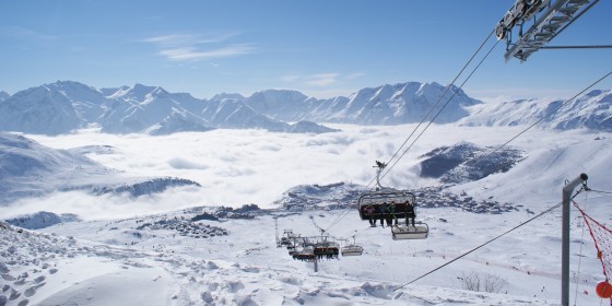 Fantastic views over the slopes of Alpe d'Huez from the top of a ski lift