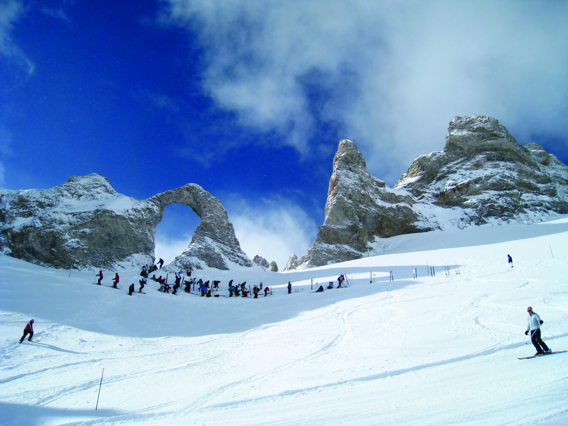 The snowy mountains of Tignes with lots of skiers.