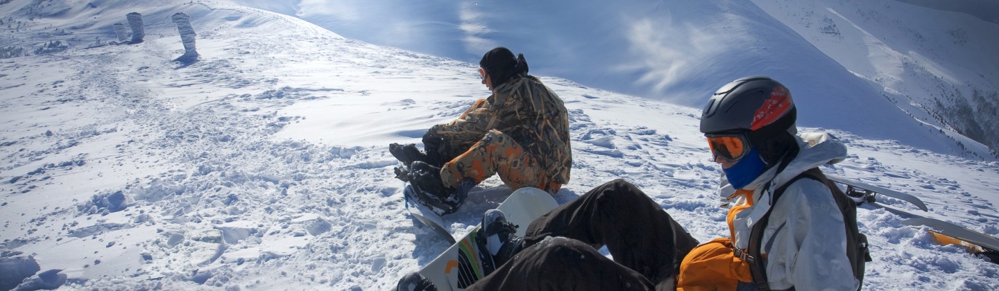 Snowboarders on the slopes