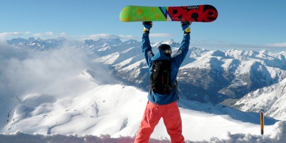 Snowboarder celebrating the view