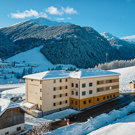 Aerial view of the Pension Muhlbacherhof in Oberlungau, Austria