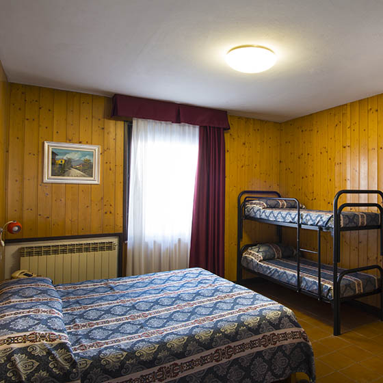 Bedroom at the Hotel Dolomiti, Passo Tonale