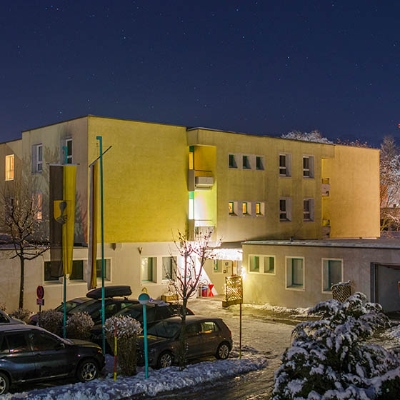 The Judendhaus Villach hotel at night in Gerlitzen, Austria