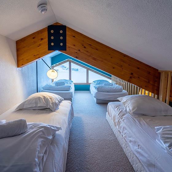 Bedroom at the HO36 Les Menuires in the French Alps