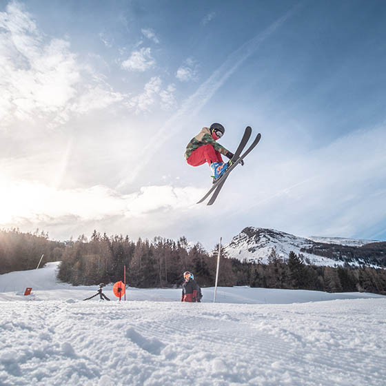 SKier jumping in the air in Val Cenis