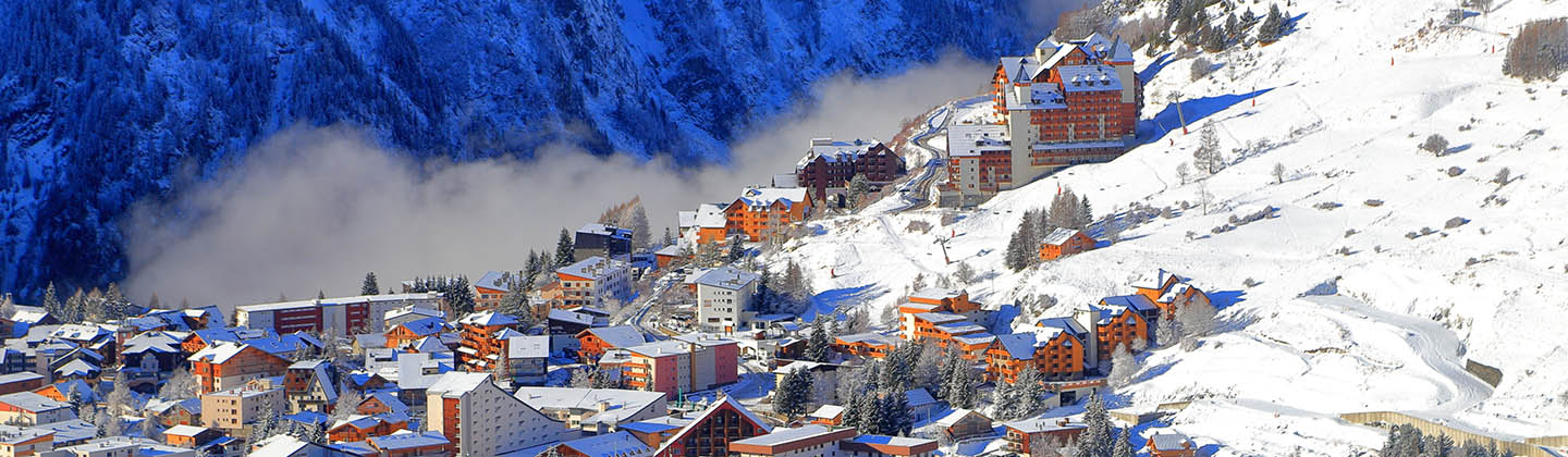 Les Deux Alpes surrounded by mountains, France