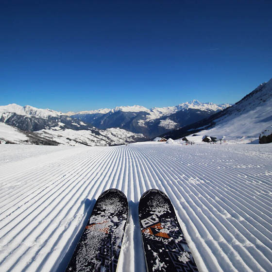 Skier ready to slide down the slope in Valmorel