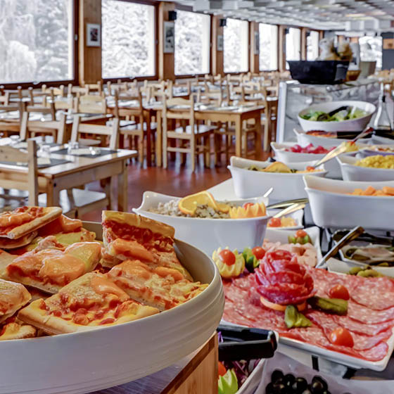 Large dining area and tasty buffet at the Village Club Mileade in Valmorel