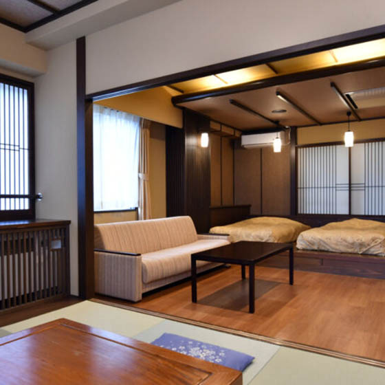 Bedroom at the Marukin Ryokan hotel in Happo Village, Japan