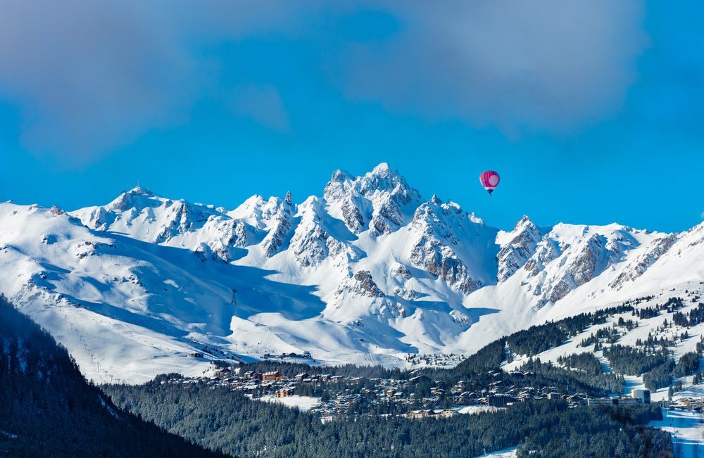 Hot air balloon flying over Courchevel
