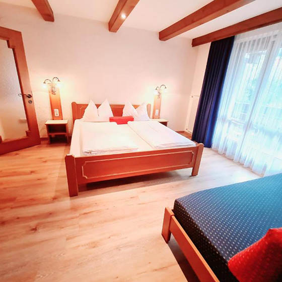 Bedroom at the Alpenlandhof hotel in Bad Kleinkirchheim, Austria