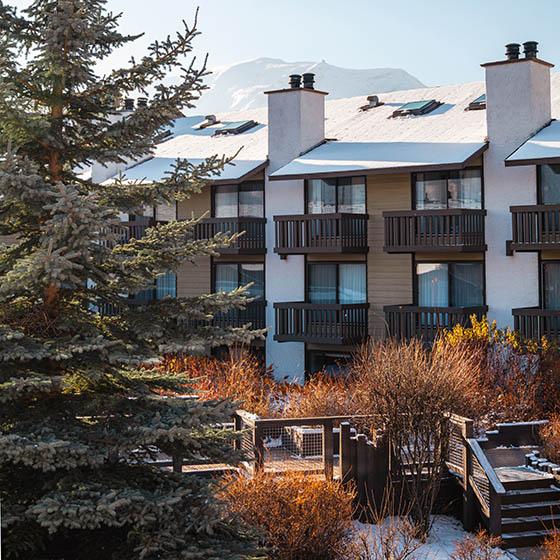 The exterior of the Jasper Inn with a thin layer of snow