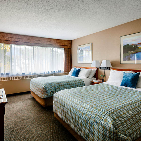 Standard bedroom at the Lobstick Lodge in Jasper, Canada