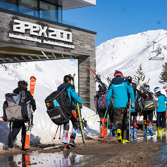 Skiers outside the APEX2100 in Tignes, France