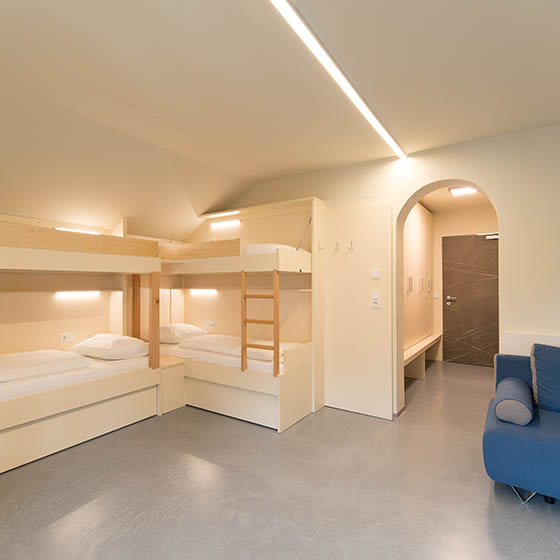 Bedroom at the Jugendhotel Striedlhof in Sportwelt, Austria