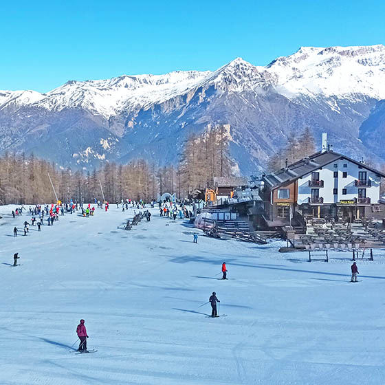 Panorama view of Sauze d'Oulx's main ski area and ESF meeting point