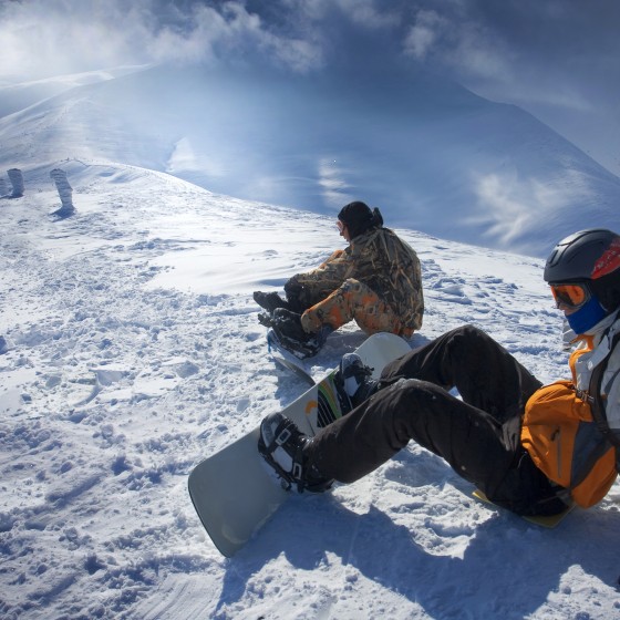 Snowboarders on the slopes