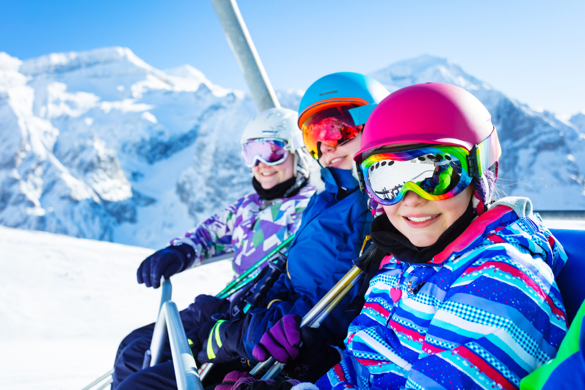 Close-up of a group of students on a ski lift