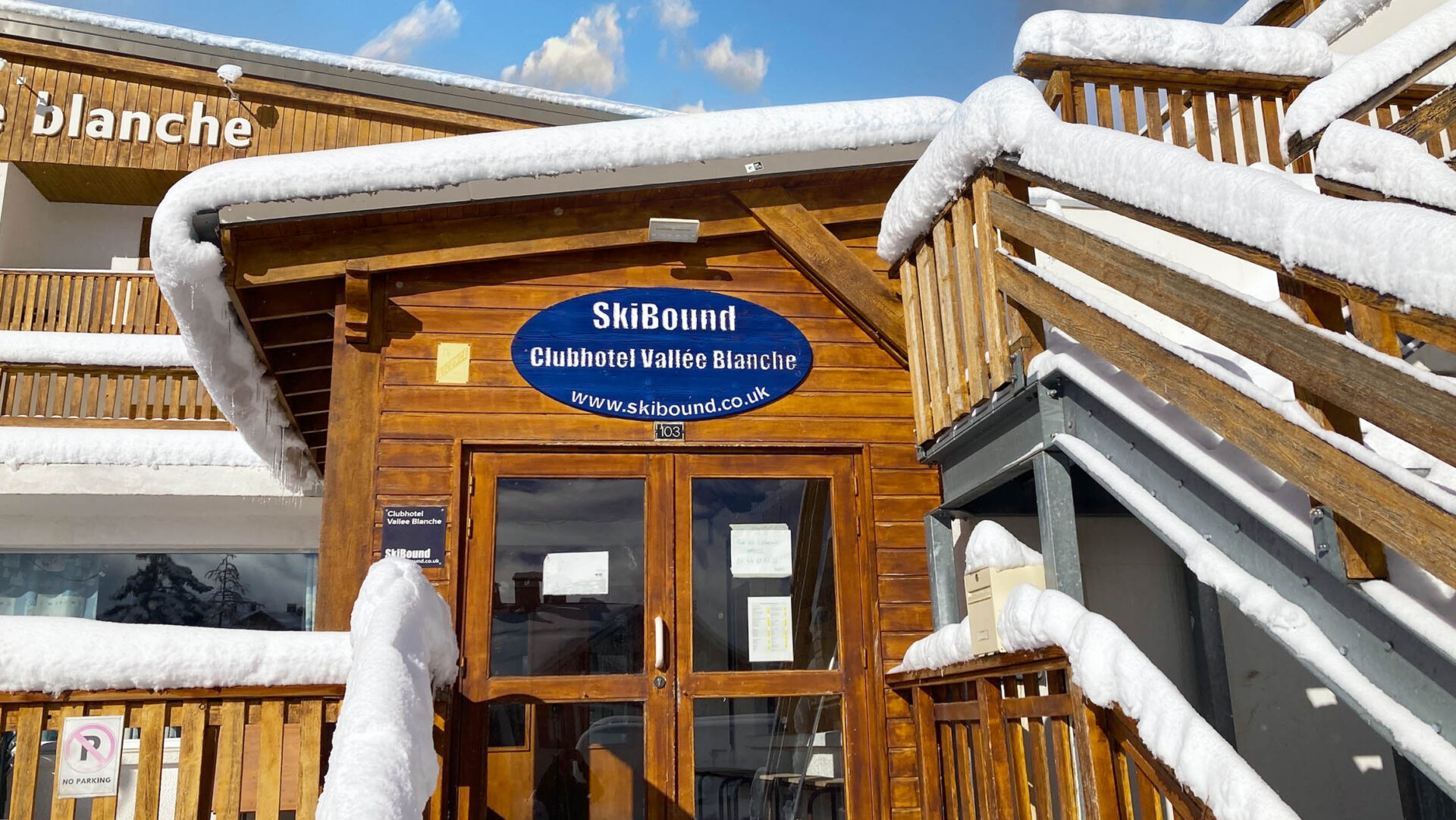 The entrance to the Vallée Blanche Clubhotel in Alpe d'Huez, covered in snow