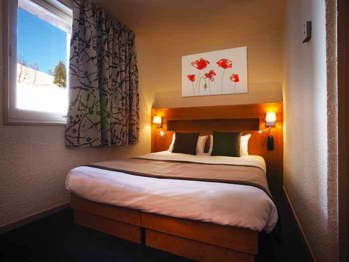 Bedroom at Hotel La Brunerie in Les Deux Alpes, France