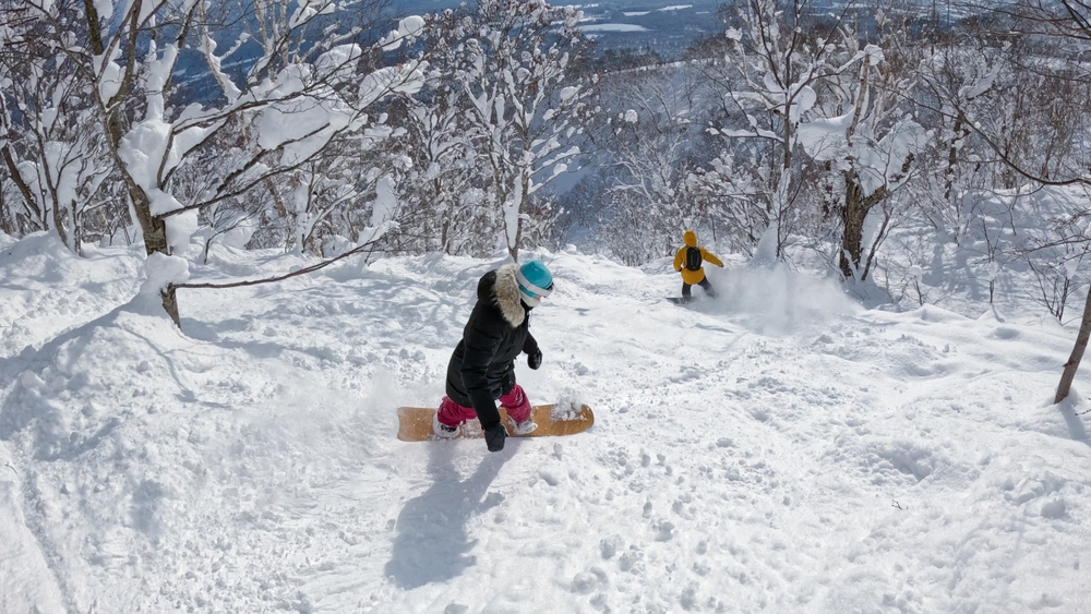 Snowboarders in Hakuba, Japan