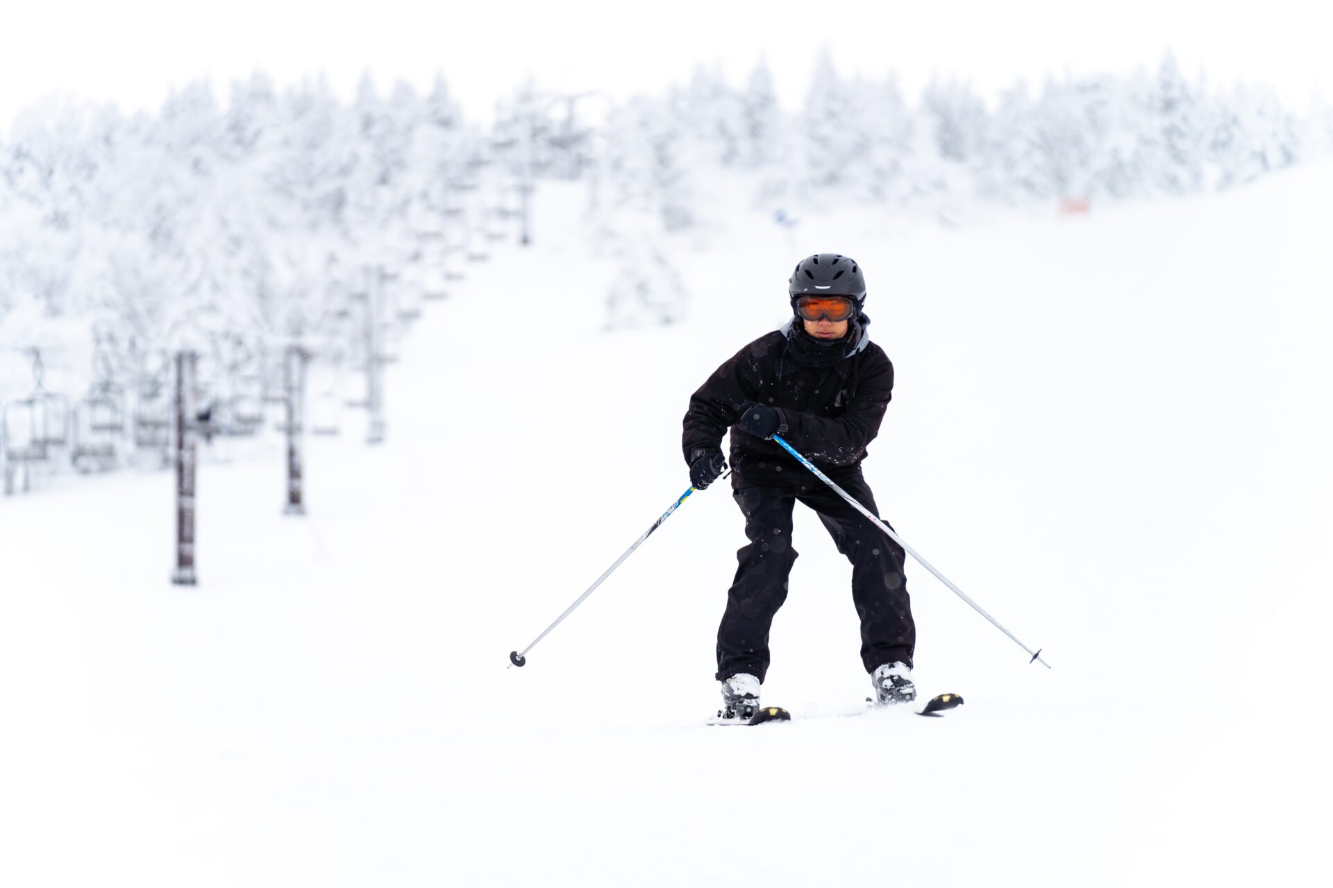 Skier sliding down the piste in Japan