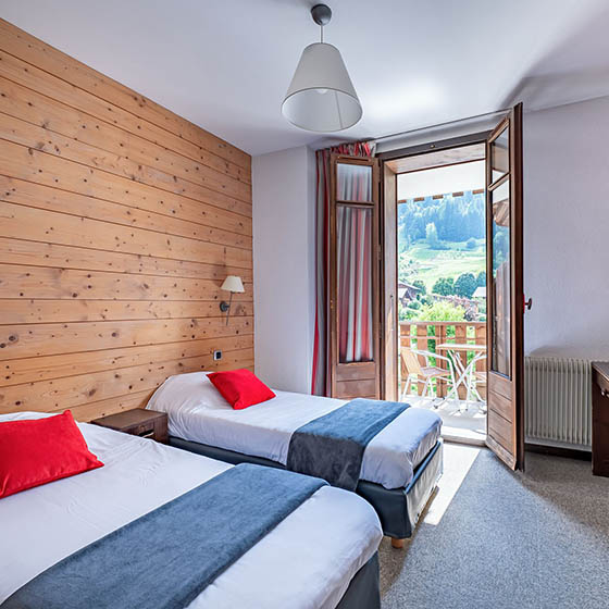 Bedroom at the Mileade Village Club l'Hauturiere in Morzine, France