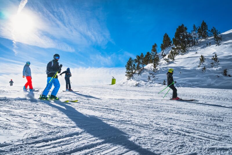 Group of skiers on the slopes in Grandvalira, Andorra
