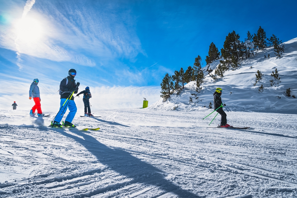 Group of skiers on the slopes in Grandvalira, Andorra