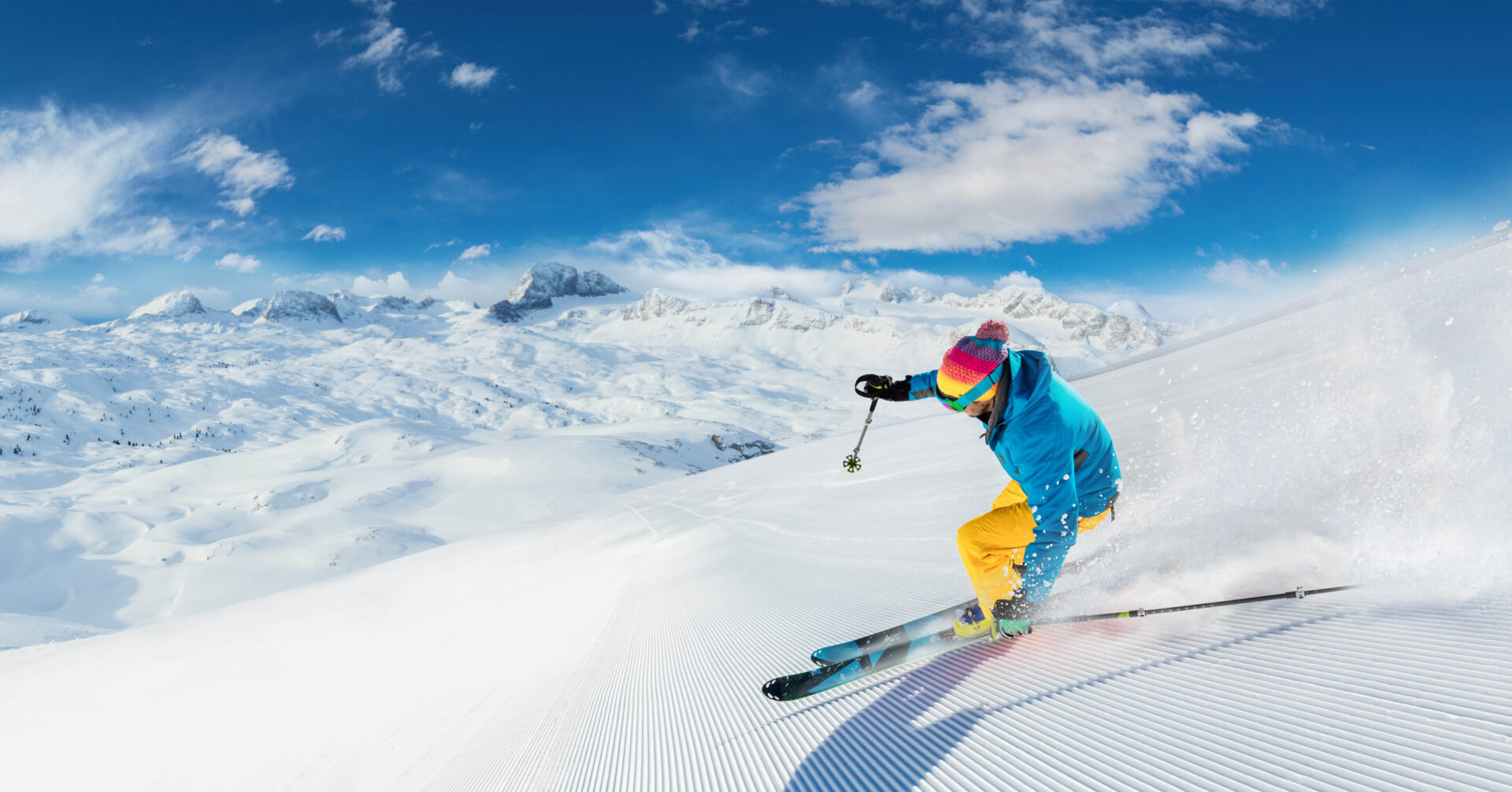 Alpine skier skiing downhill in Italy