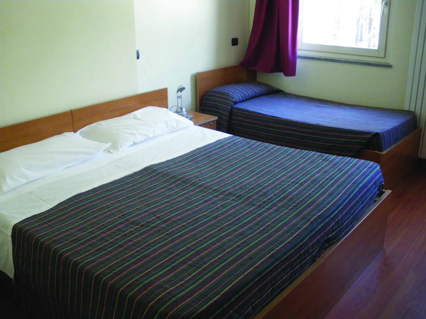 Bedroom at the Olympic Village Hotel in Bardonecchia, Italy
