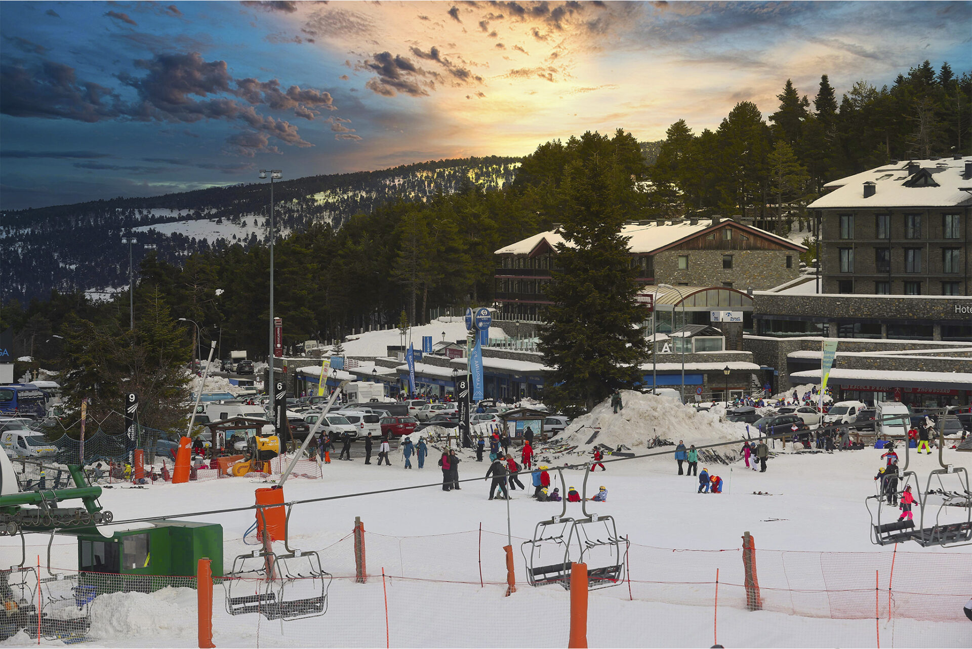 Sunset over the pistes and charlifts outside the Guitart Aparthotel in La Molina, Spain