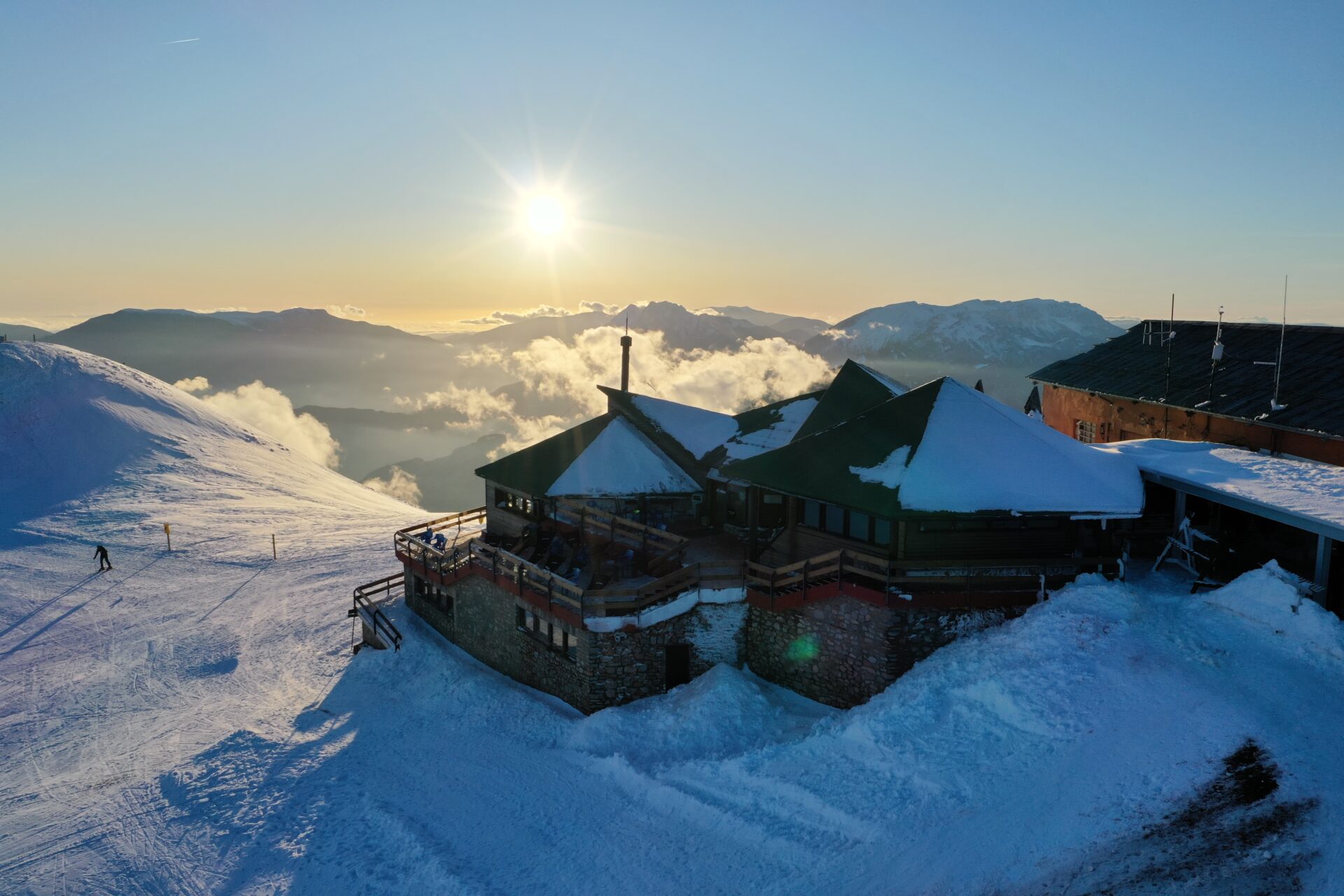 A refuge covered in snow at sunset in La Molina resort, Spain